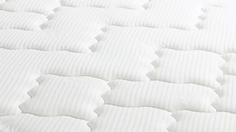 Et nærbillede af Sealy Posturepedic Pearl Luxury Pillow Top madrasbetræk.